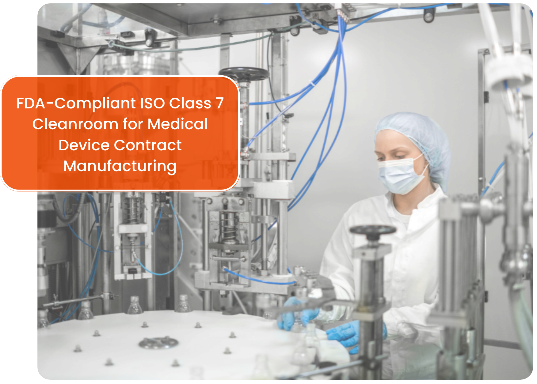 An employee working in a cleanroom contract manufacturing facility in the USA.