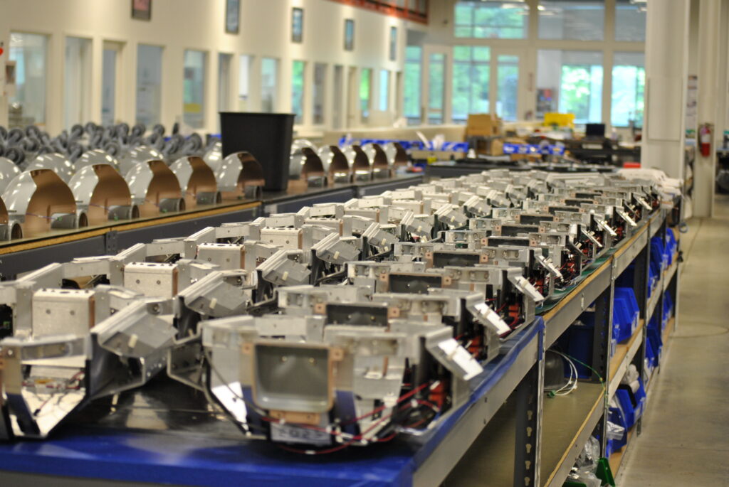 Electronic assembly line building PCBAs with parallel workflows for faster timelines