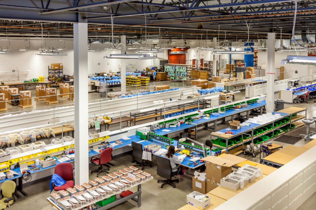 Illustration of contract manufacturing benefits, including cost reduction, quality control, supply chain, and fulfillment across the product lifecycle